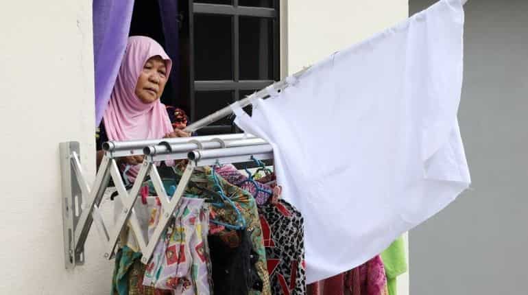 Malaysians turn to white flags to seek help as lockdown torments Malaysians turn to white flags to seek help as lockdown torments