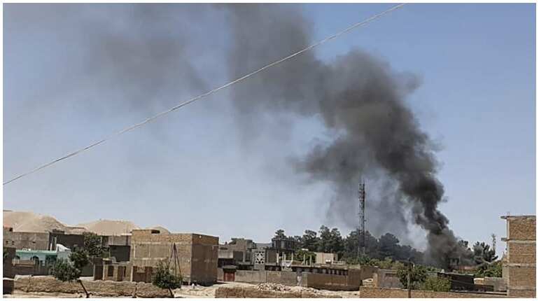 Afghan govt sends commandos as Taliban surround Afghan city