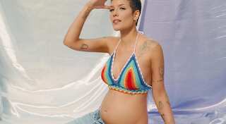 Singer Halsey flaunts her growing bump in new video, says she’s ‘been ready’