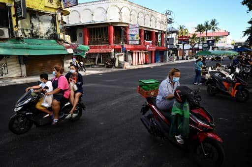 Thailand imposes night curfew in Bangkok amid surge in virus