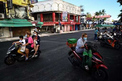 Thailand imposes night curfew in Bangkok amid surge in virus