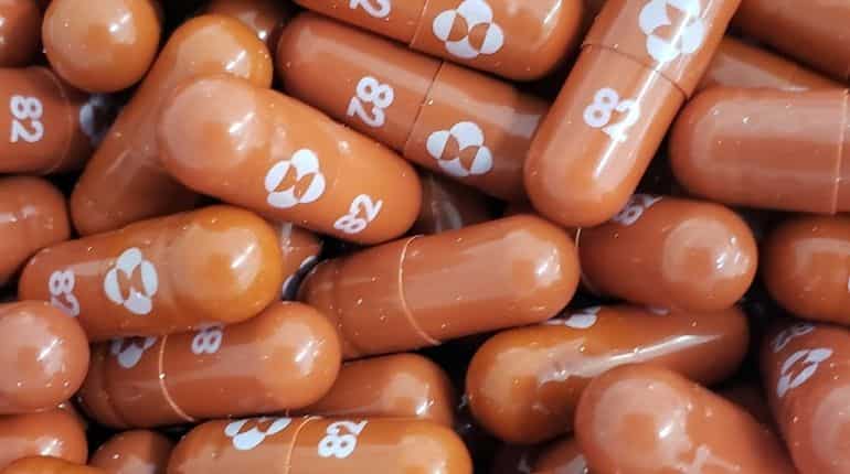 Britain becomes first country to approve Merck's anti-COVID-19 pill