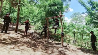 Myanmar rebel group suspends key leader in massacre investigation