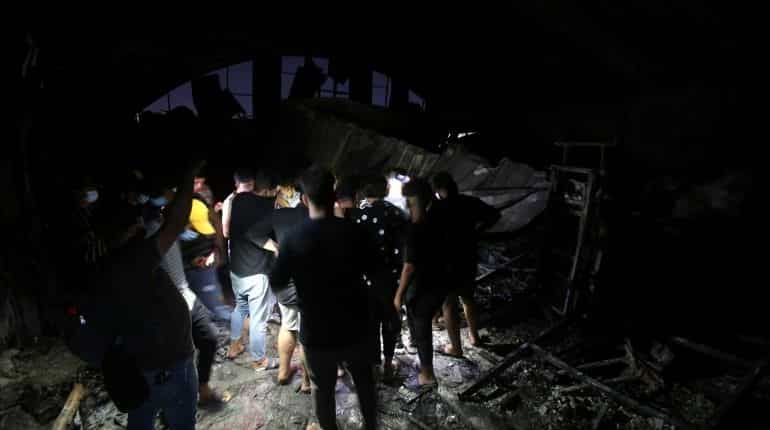 At least 52 killed, 67 injured in a coronavirus hospital fire in Iraq