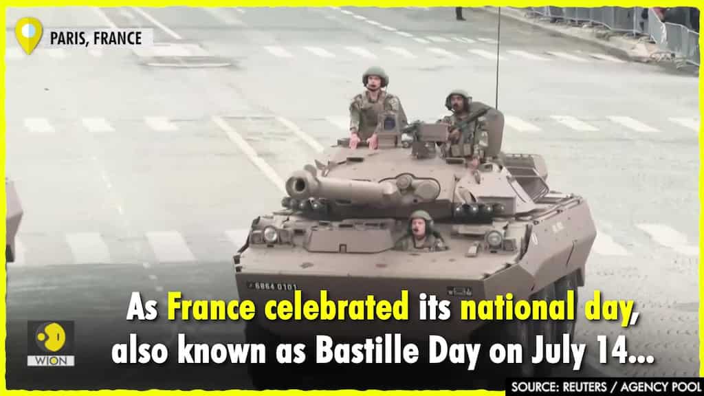 Military personnel march on Paris' Champs Elysees for Bastille Day parade