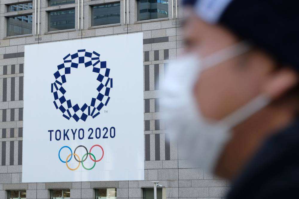 An athlete, 5 Olympic workers test positive for COVID as opening ceremony nears