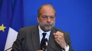 French Justice Minister Eric Dupond-Moretti charged in conflict of interest probe