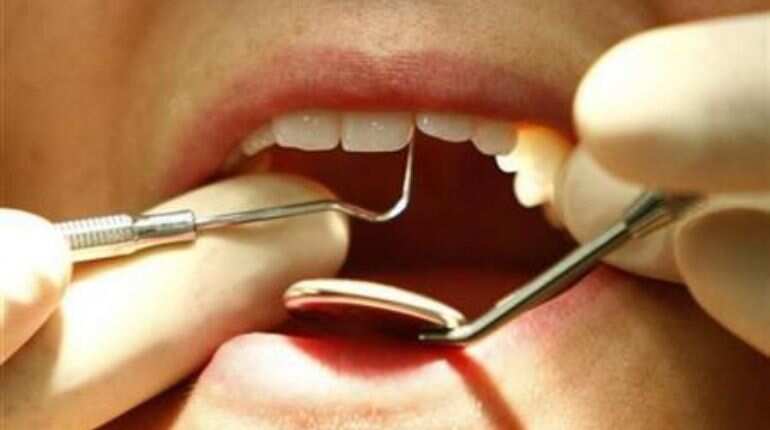 Nevada woman breaks into dentist's office, pulls 13 teeth from patient: Police
