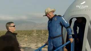 'It's dark up here': Amazon founder Jeff Bezos fulfills childhood dream in Blue Origin space flight