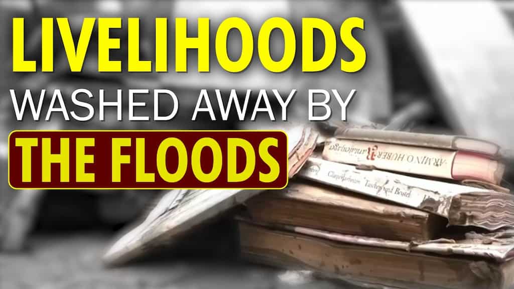 Antique books and vintage wine - livelihoods ruined by the floods