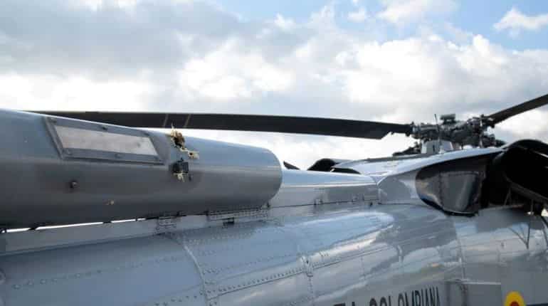 Colombia arrests 10 over attacks on Duque's helicopter, military base