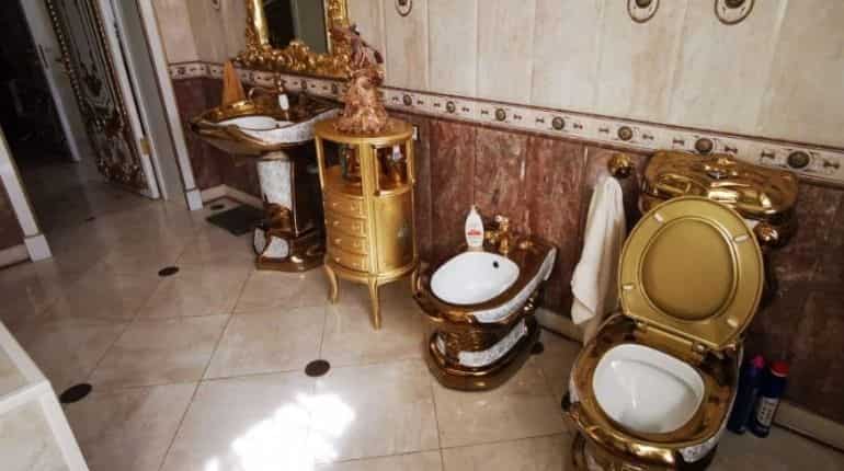 Cop's golden toilet steals the show during bribery investigation Cop's golden toilet steals the show during bribery investigation