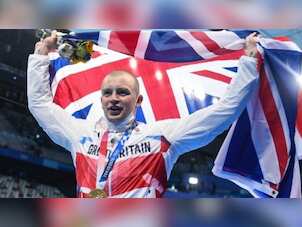 Tokyo 2020: Britain's Adam Peaty wins 100m breaststroke gold to defend Olympic title
