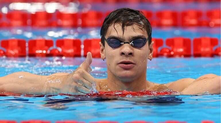 Olympics: Swimming- 'Overwhelmed' Rylov ends barren Russian run with 100m backstroke gold Olympics: Swimming- 'Overwhelmed' Rylov ends barren Russian run with 100m backstroke gold