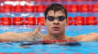 Olympics: Swimming- 'Overwhelmed' Rylov ends barren Russian run with 100m backstroke gold