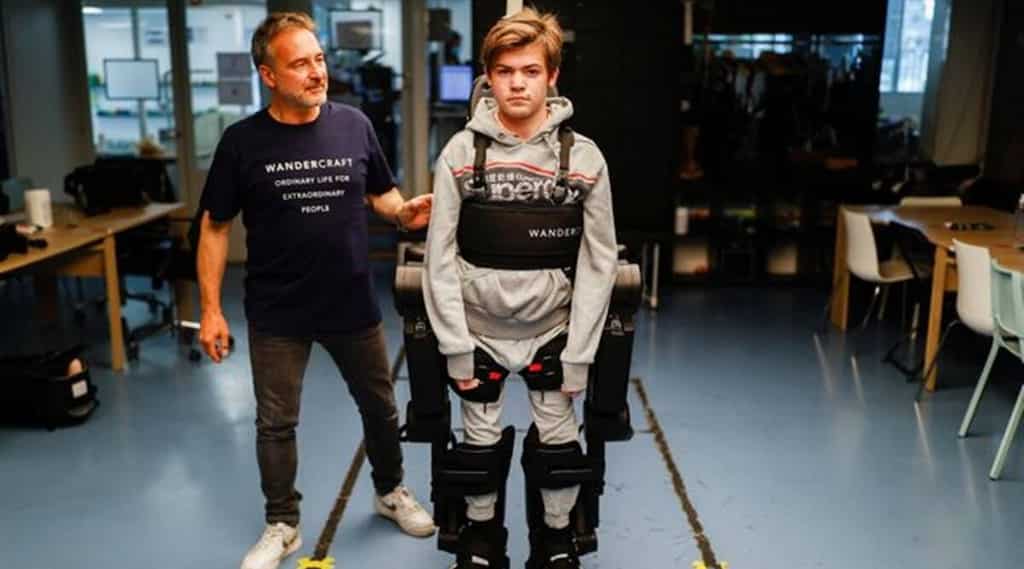 French father builds voice-controlled exoskeleton to help his wheelchair-bound son walk