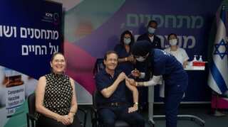 Israeli President Isaac Herzog gets third dose of Pfizer vaccine, urges boosters for over-60s