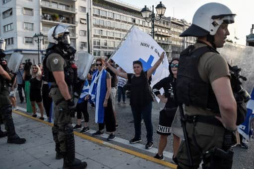 Greece sends police to popular tourist hotspots as COVID-19 erupts