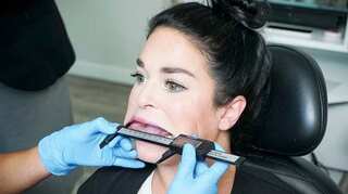 Woman wins the Guinness World Record for largest mouth gape