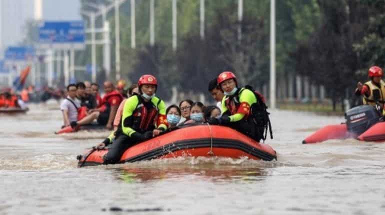 Corpses afloat in car parks, tunnel: China floods death toll rises to 302