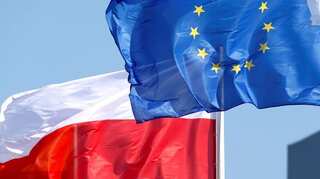 Poland says will water down controversial justice reform