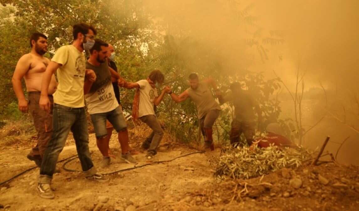 Thousands evacuated, many fleeing on foot