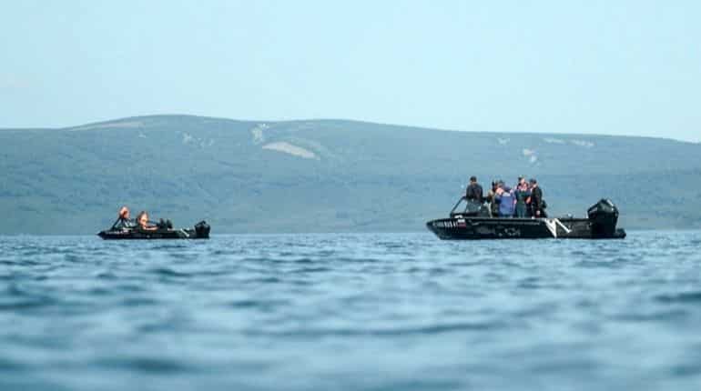 Eight feared dead as Russia tourist helicopter crashes into lake Eight feared dead as Russia tourist helicopter crashes into lake