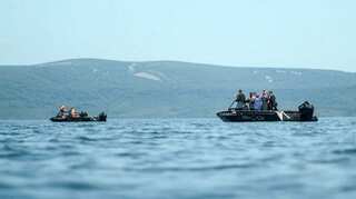 Eight feared dead as Russia tourist helicopter crashes into lake