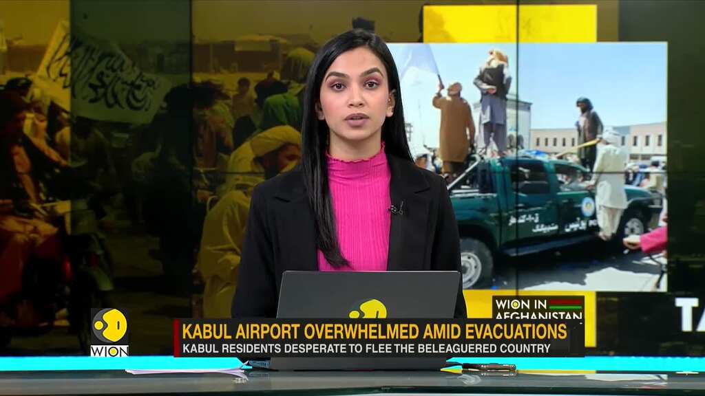 Kabul airport overwhelmed amid evacuations of Afghans after Taliban's siege in country