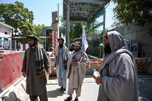 Taliban soldiers guard the green zone