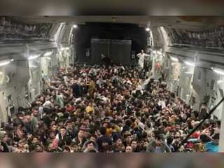 Inside pictures of plane at Kabul airport as Afghans battle to flee Taliban rule