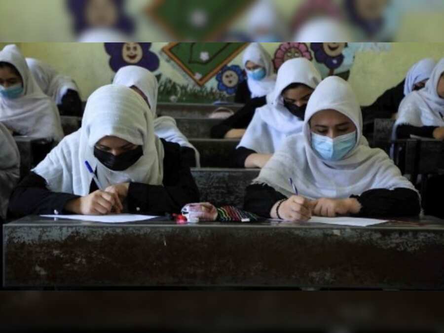 Girls in Afghanistan to return to school 'as soon as possible', say Taliban