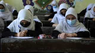 Girls in Afghanistan to return to school 'as soon as possible', say Taliban