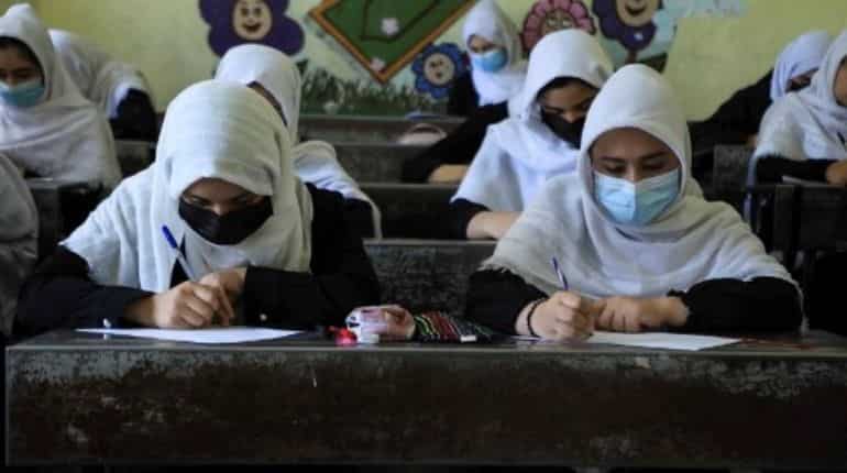 Girls in Afghanistan to return to school 'as soon as possible', say Taliban