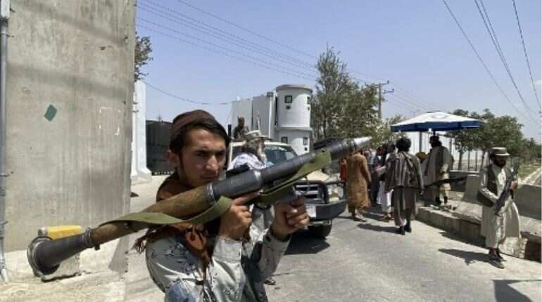 Taliban fighter holds RPG rocket