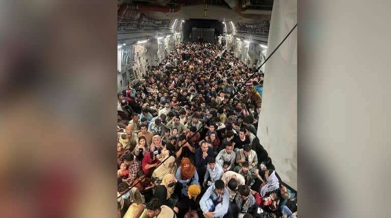 People clambered onto the flight from Kabul
