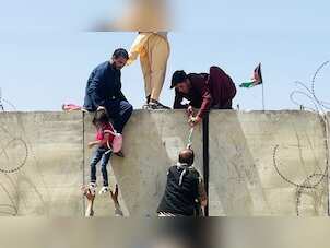 Heartbreaking: Desperate Afghan mothers throw children over Kabul airport fence in bid to escape Taliban
