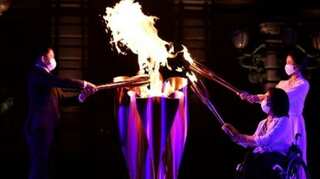 Paralympic flame in Tokyo as virus surges days before opening