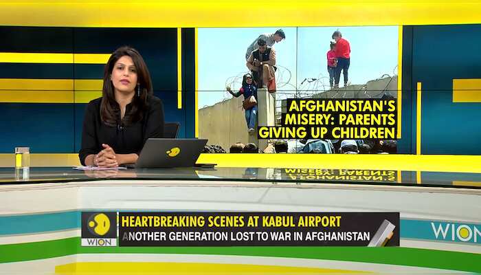Gravitas: Afghan parents pass children over airport wall