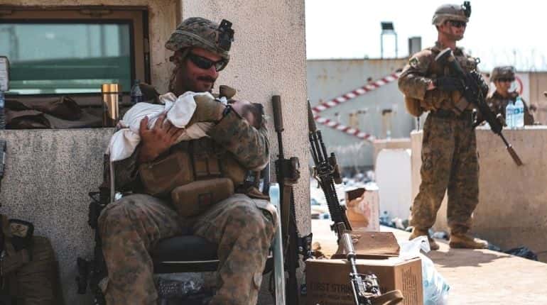 ‘Handling with care’: US military comforts infants at Kabul airport amid facilitating evacuations 