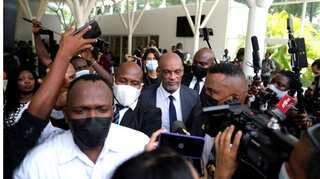 Watch: Haiti's PM driven out from official ceremony after armed gangs shoot in the air
