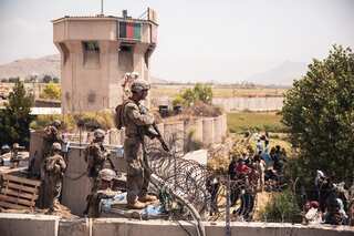Gun battle between soldiers and assailants at Kabul airport; 1 Afghan guard killed