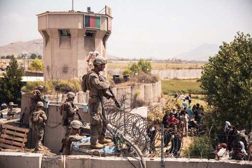 Gun battle between soldiers and assailants at Kabul airport; 1 Afghan guard killed