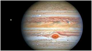 Jupiter collides with a space rock, collision causes flash in its atmosphere