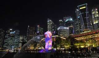 Singapore to ease virus curbs for migrant workers