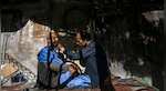 Kabul barber fears uncertain future under Taliban rule while residents hope for jobs