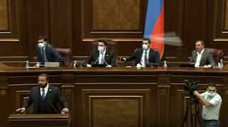 Lawmakers throw bottles at each other, as brawl breaks out in Armenian parliament