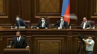 Lawmakers throw bottles at each other, as brawl breaks out in Armenian parliament