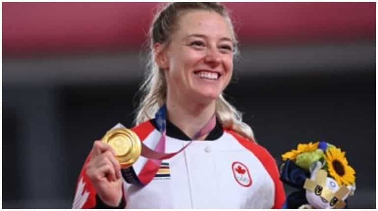 Tokyo Olympic gold medallist Kelsey Mitchell wins hearts with her epic security check prank - watch Tokyo Olympic gold medallist Kelsey Mitchell wins hearts with her epic security check prank - watch