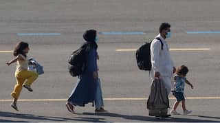 Yellow and smiles: Young Afghan girl seen skipping out of happiness after leaving Taliban regime